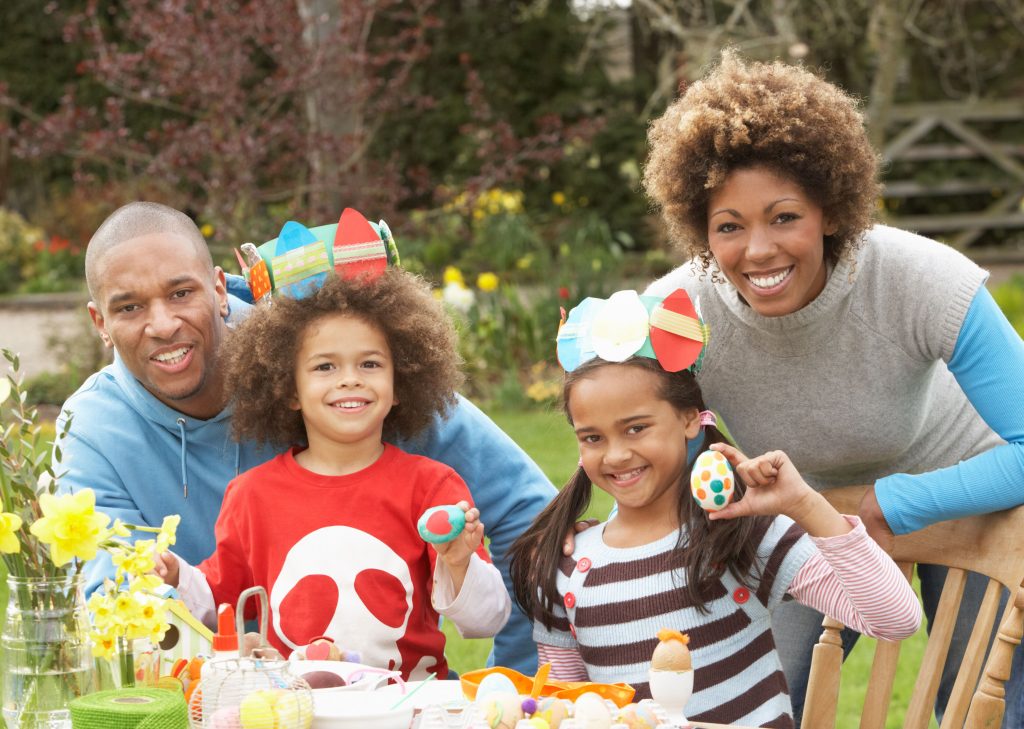 Light-skinned African family celebrating Easter.