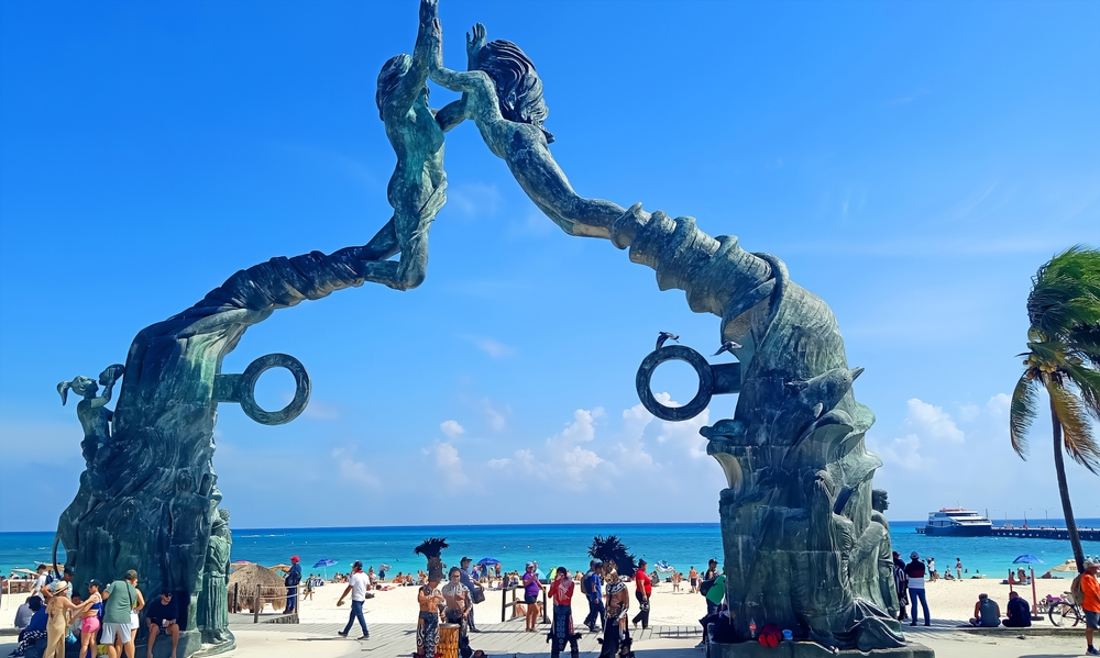 PLAYA DEL CARMEN MEXICO is one of the family-friendly vacation destinations. Portal Maya the monument, standing over 50 feet high, portrays a man and a woman, being pushed upwards by a spiral of wind and water, and holding hands. 